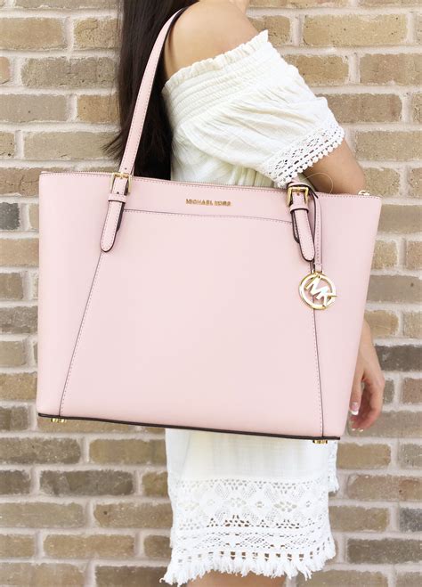 michael kors karsean pastel pink tote bag|Michael Kors pink suitcase.